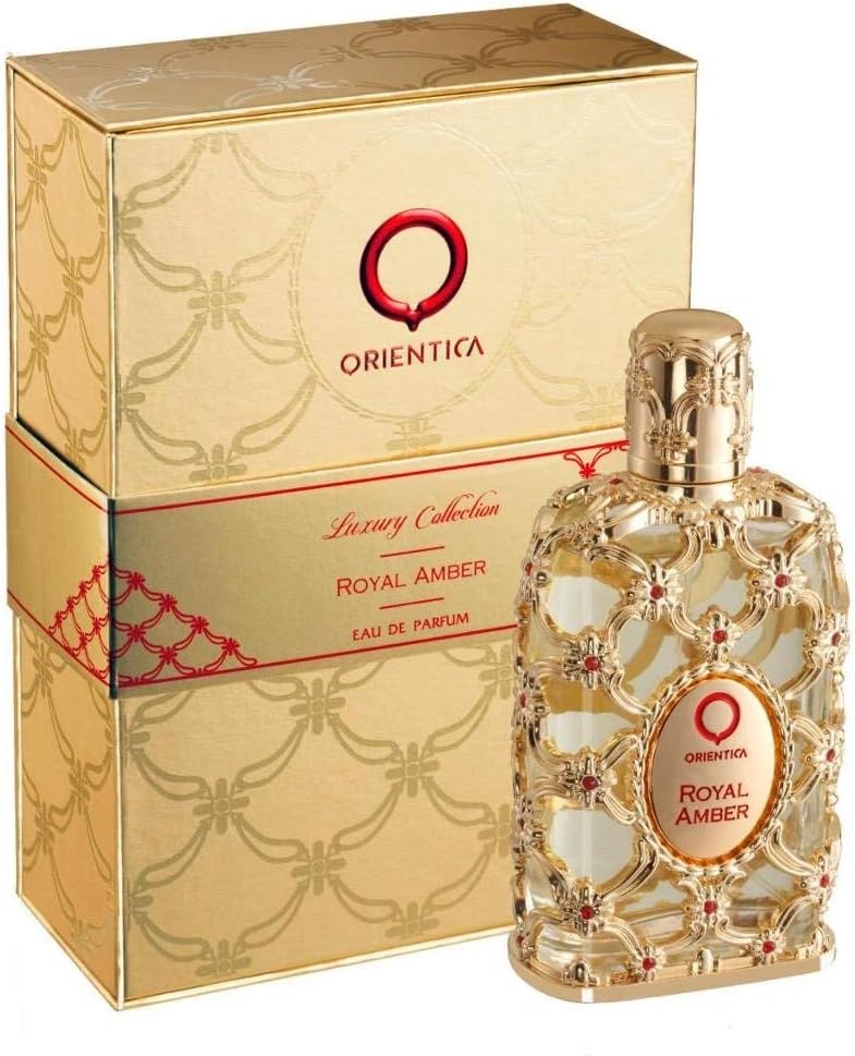 Perfume Orientica Premium Royal Amber – frasco luxuoso âmbar com detalhes dourados, acompanhado de uma caixa elegante dourada com detalhes vermelhos, transmitindo sofisticação e exclusividade.